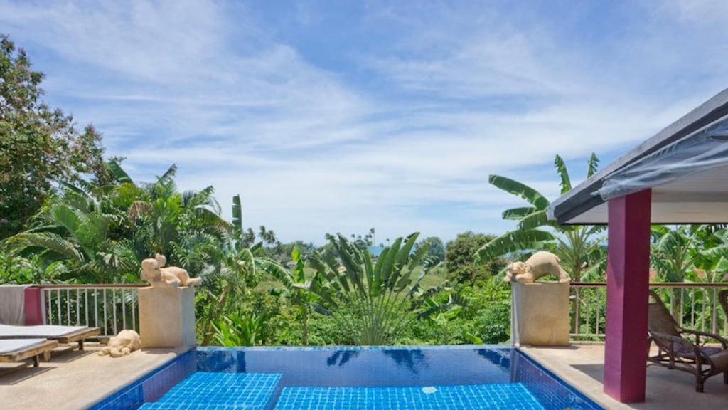 Rocking Chair Pool Villa — pool with tropical view